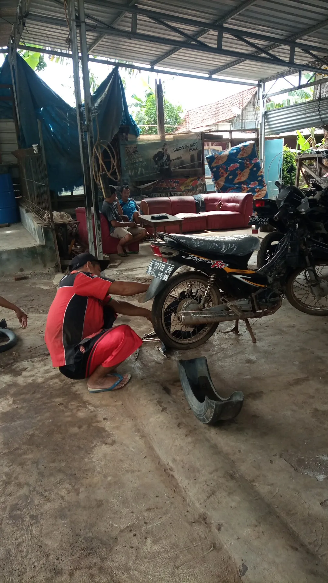 Bengkel motor andi odang