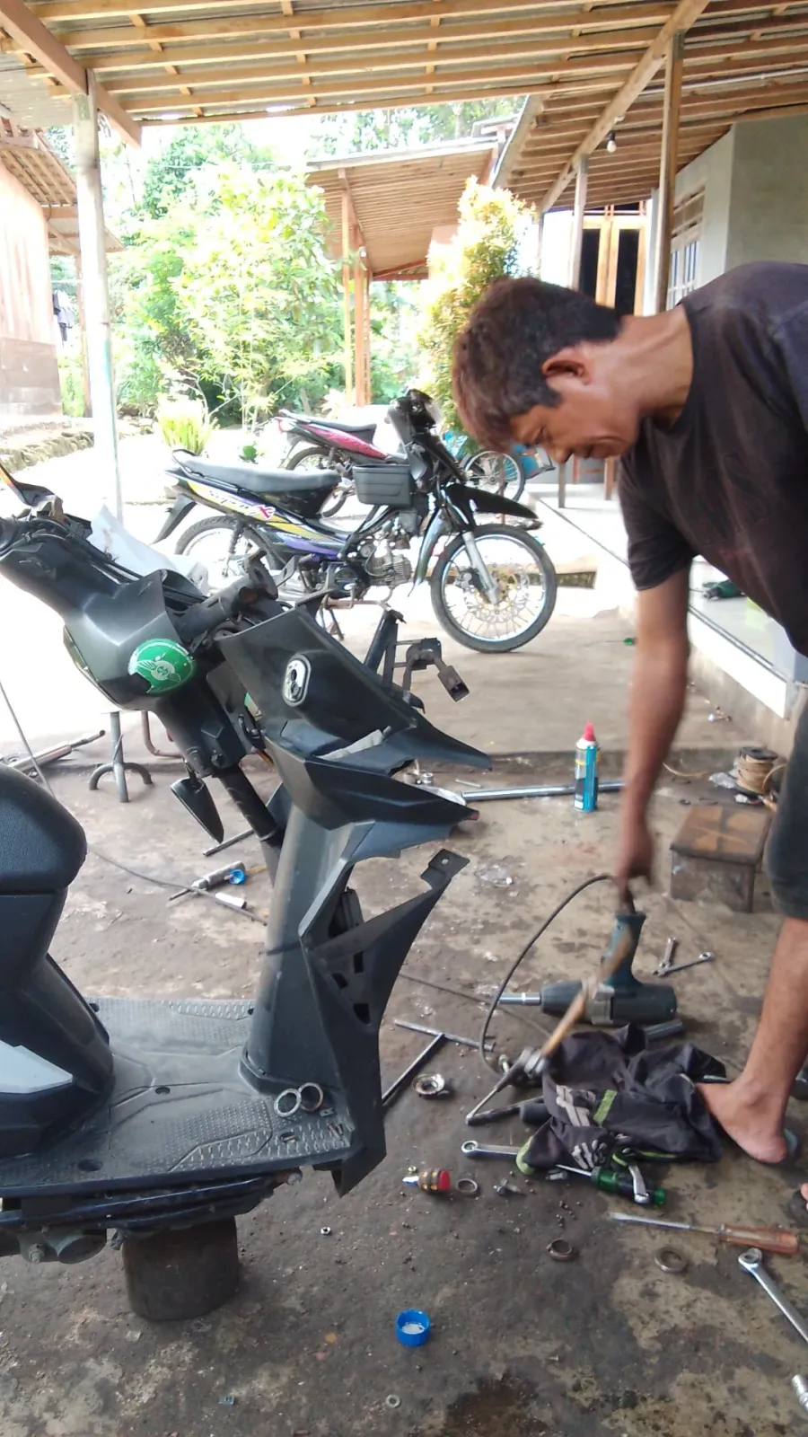 Bengkel Motor Tajib