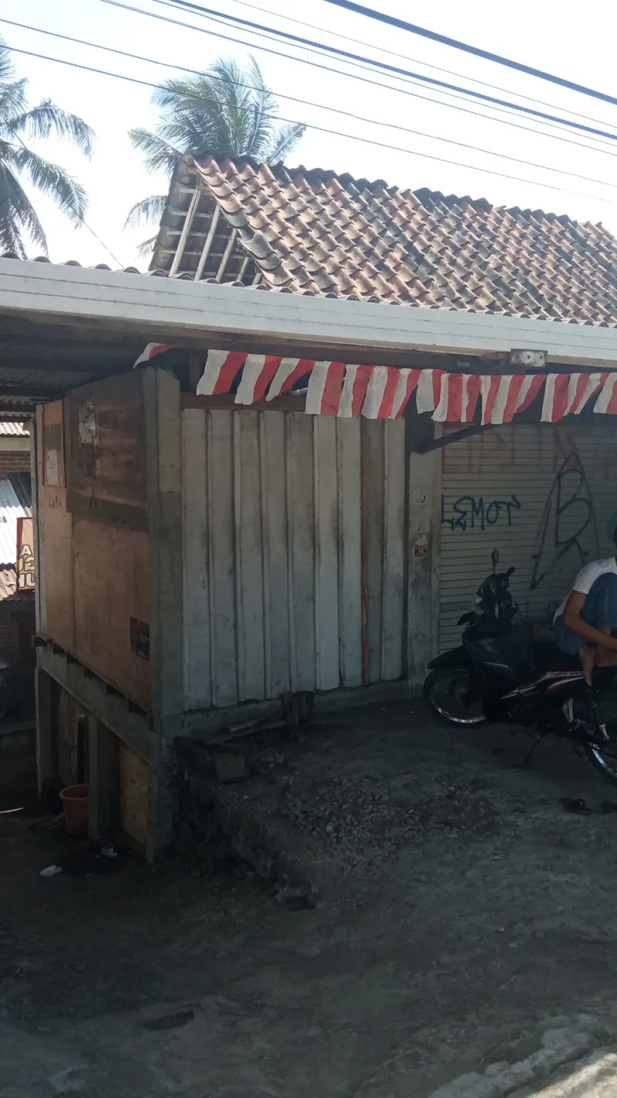 Bengkel Tambal Ban & Cucian Motor Pak Fai