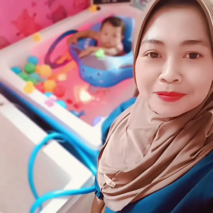 Bidan Rini Purnamawati,mom & baby spa