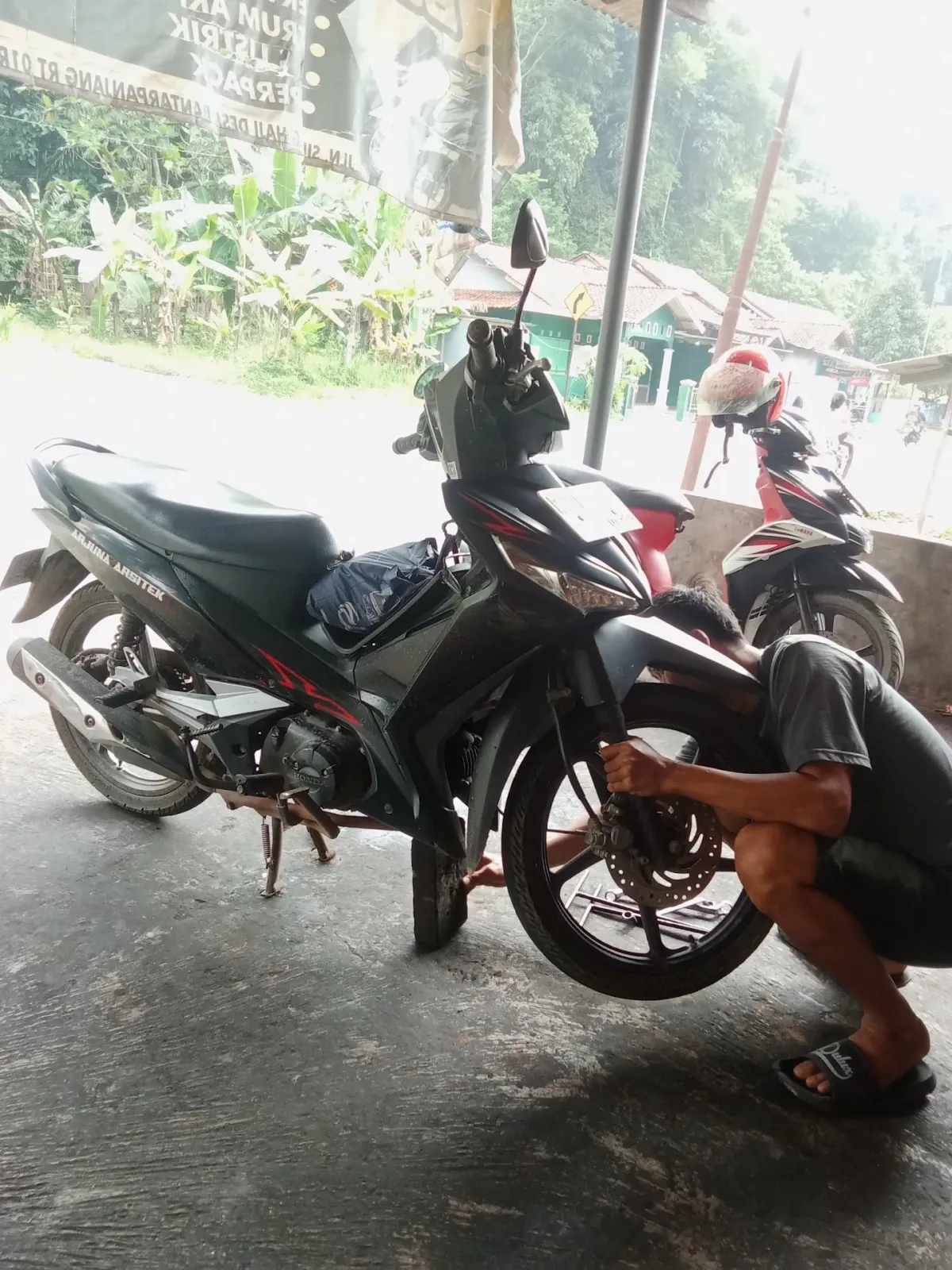 Budi Bengkel Motor