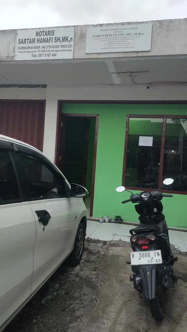 Notaris Sartam Hanafi, SH., M.Kn
