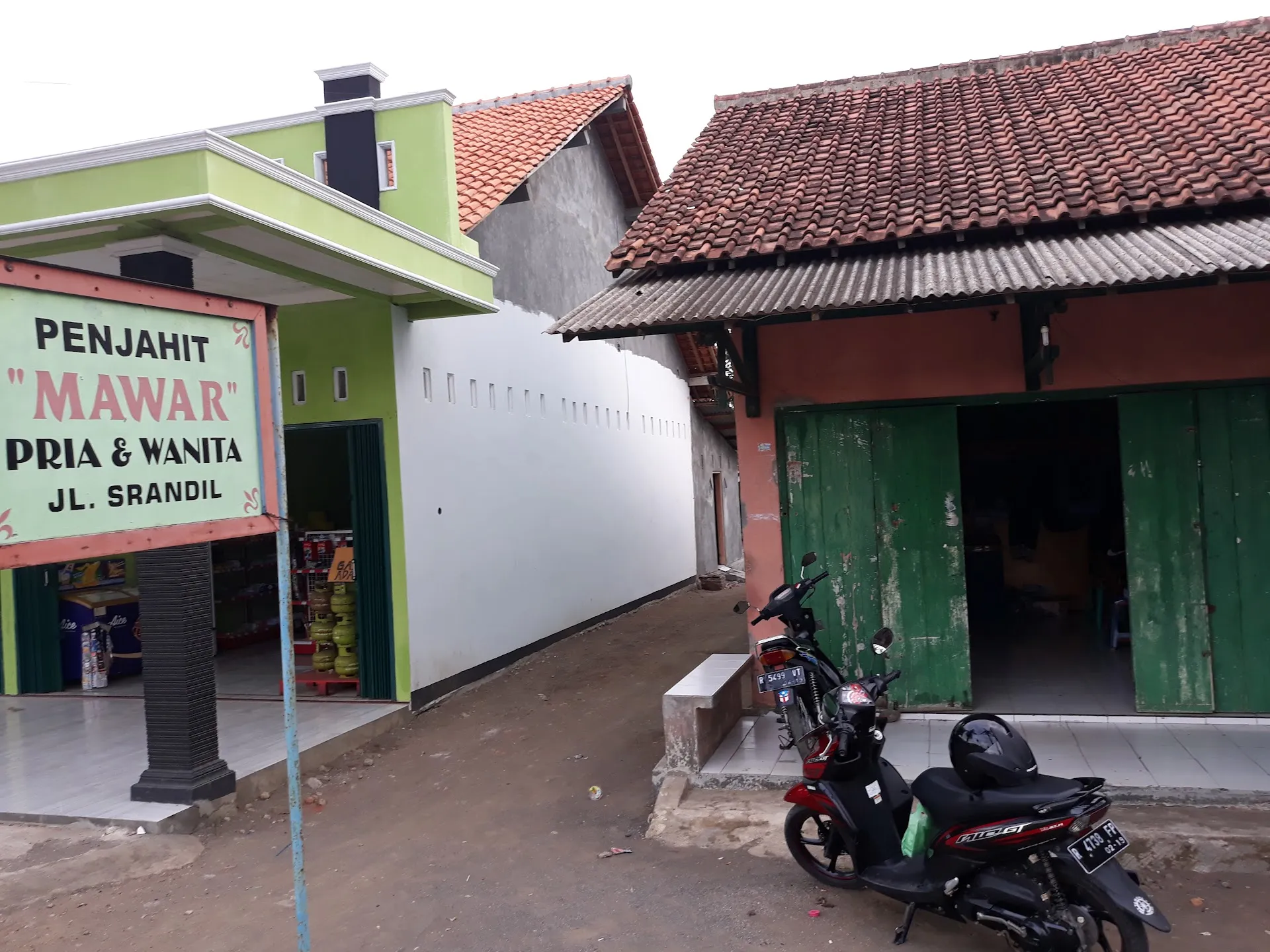 PENJAHIT MAWAR