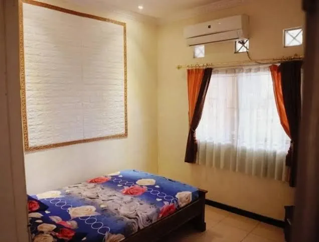 Rumah penginapan keluarga 4 kamar - Dissa guest house