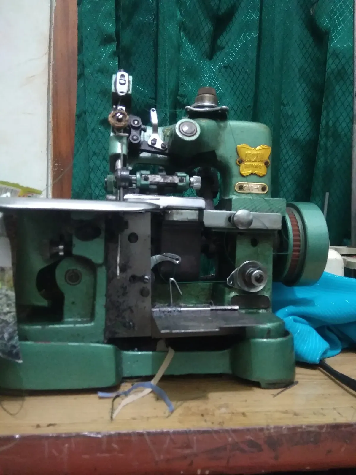 service mesin jahit karung