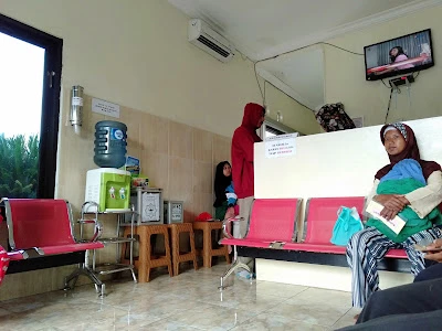 Dr Frida Eriyanto