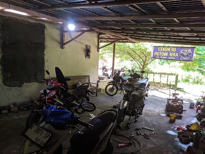 Arif bengkel motor