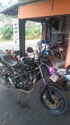 Bengkel Motor "Empat Saudara"