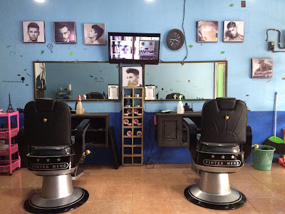 EVOLUTIONS BARBERSHOP