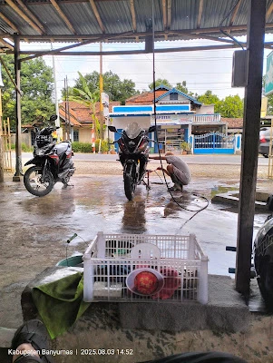 Brayan cuci motor