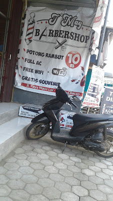 J May Babershop