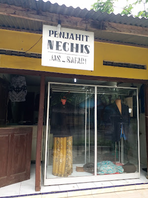 PENJAHIT NECHIS